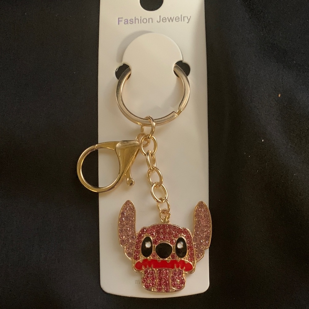 Pink and gold rhinestone stitch themed keychain
